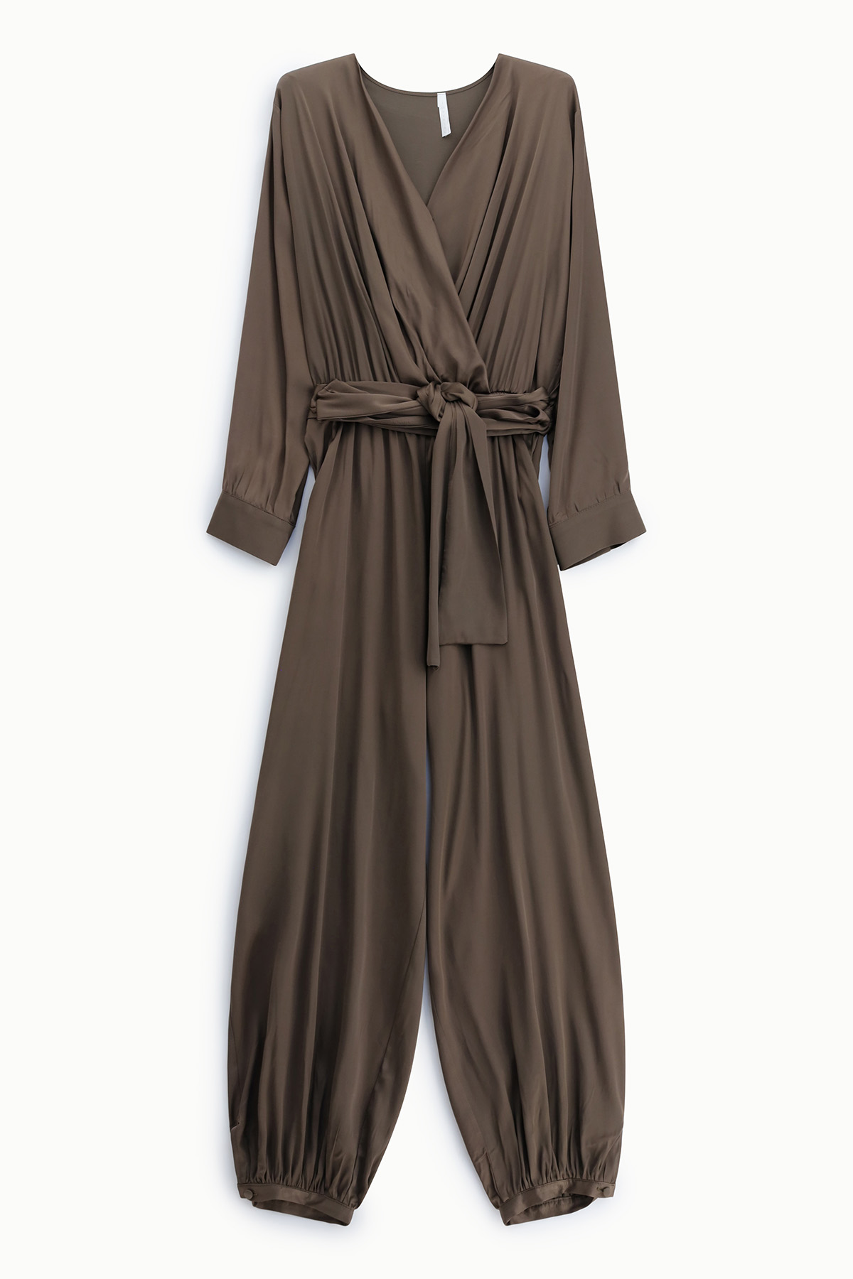 Brown long-sleeve wrap jumpsuit with tie waist, pleated V-neck bodice and cuffed ankles on white background