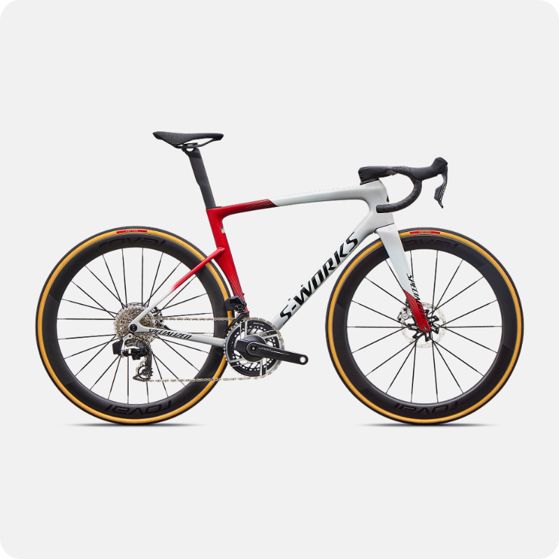 Specialized S-Works road racing bicycle in white and red with deep-section carbon wheels and tan-wall tyres, side view