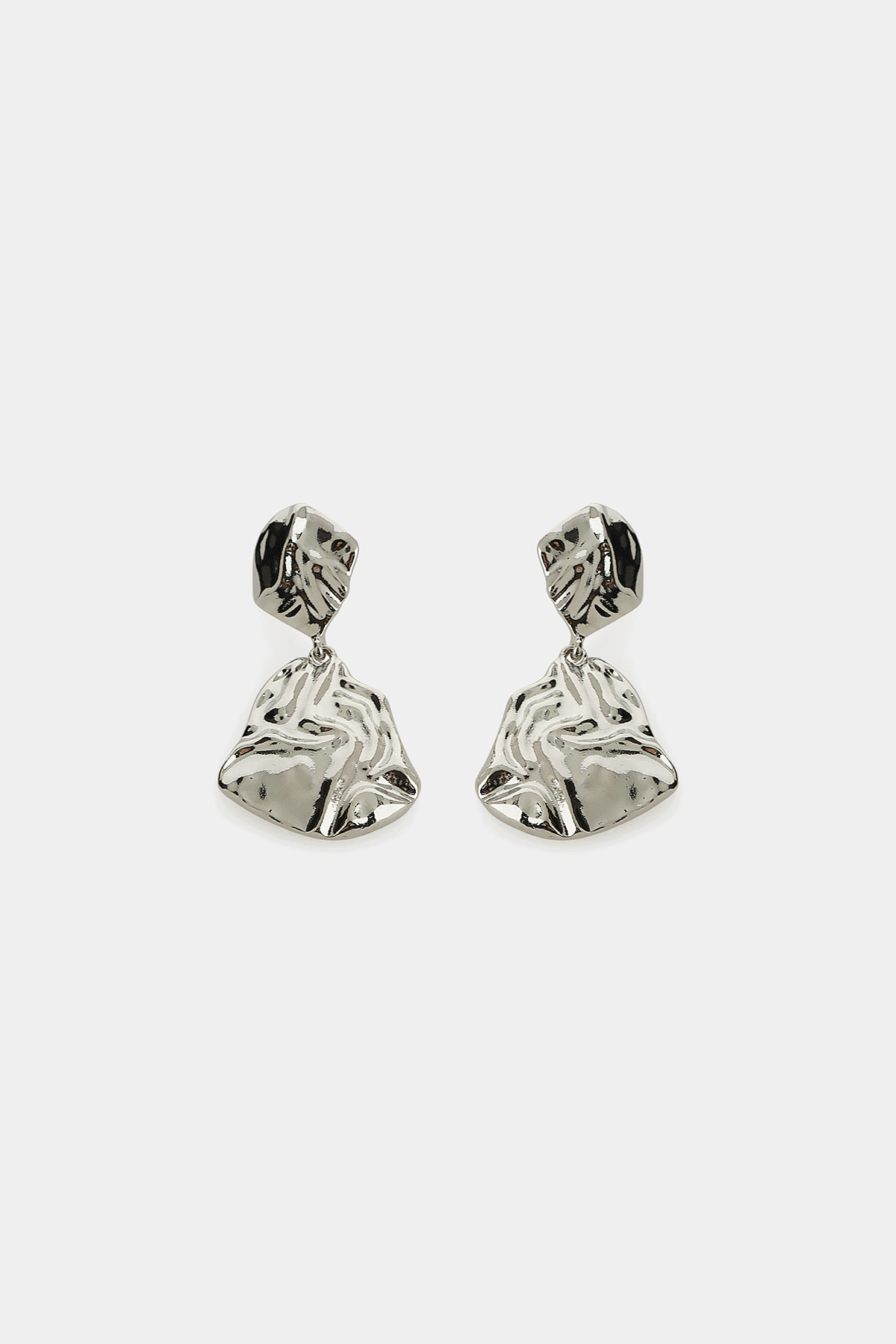 Two pairs of textured drop earrings, silver (left) and gold (right), displayed on a white background