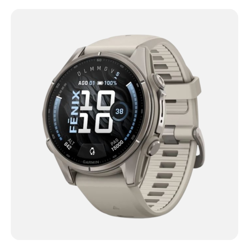 Beige titanium Garmin Fenix smartwatch with round AMOLED display showing fitness stats and silicone strap