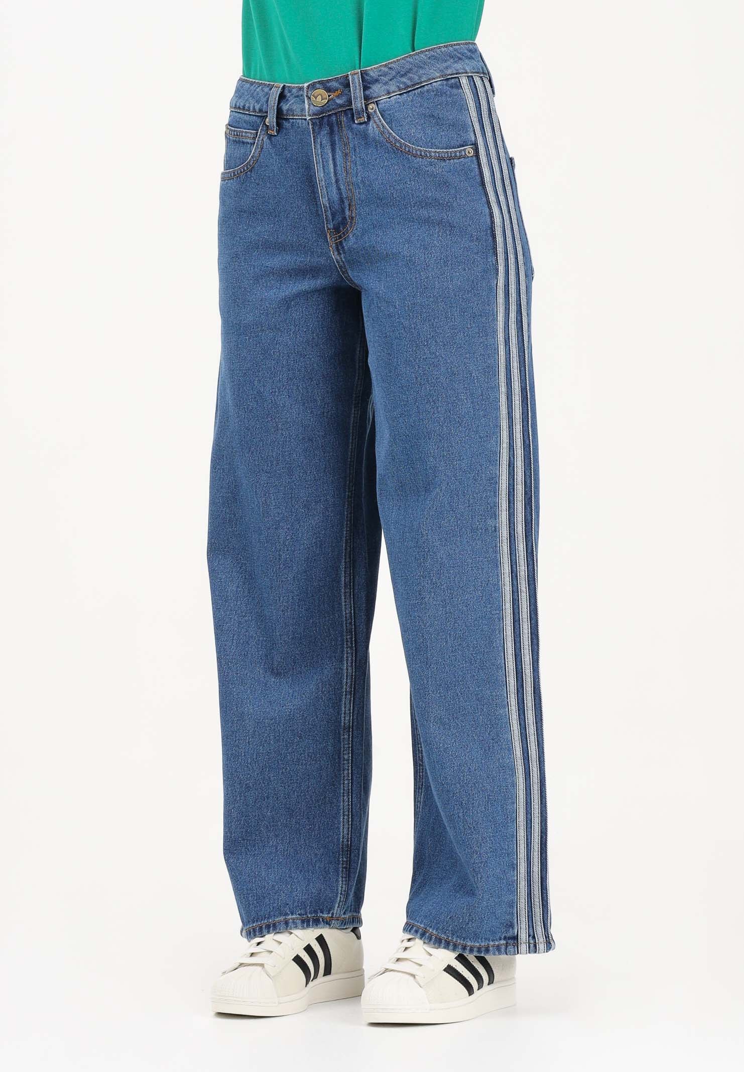 Image of ADIDAS ORIGINALS Jeans FIREBIRD in denim medio da donna