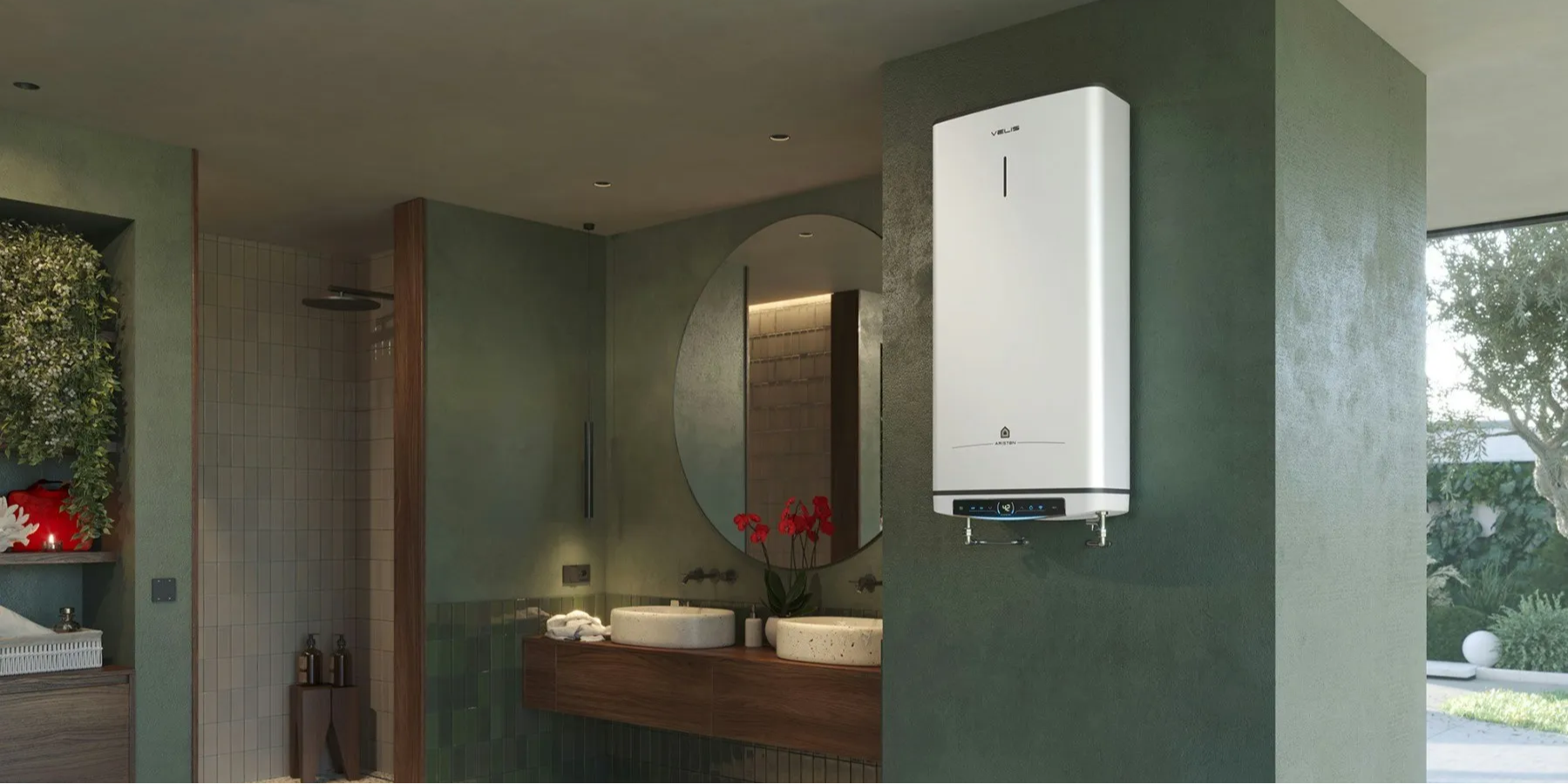 Modern wall-mounted electric water heater in a stylish green bathroom with round mirror and basin