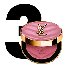 Un grande numero "3" nero accanto a un blush compatto rosa trapuntato YSL aperto.