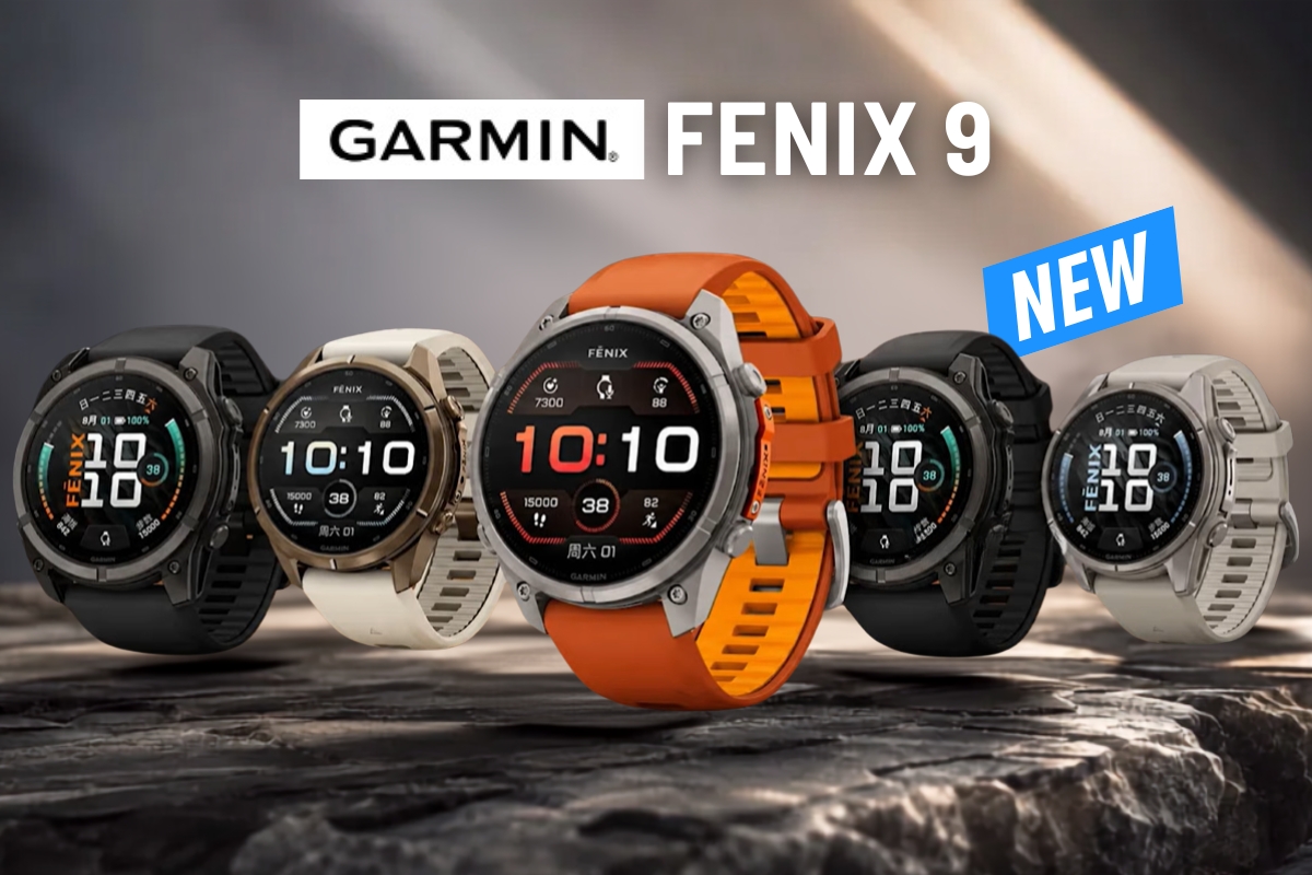 Garmin Fenix 9 smartwatches lineup on stone surface, five models in black, silver, white and orange, labelled NEW