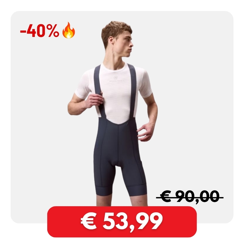 Cycling bib shorts on model with white base layer, black bib shorts on sale 40% off €53.99 (was €90)