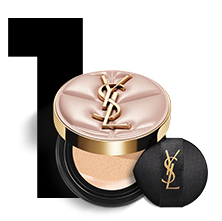 Un grande numero "1" nero accanto a un fondotinta cushion rosa YSL aperto con il suo applicatore.