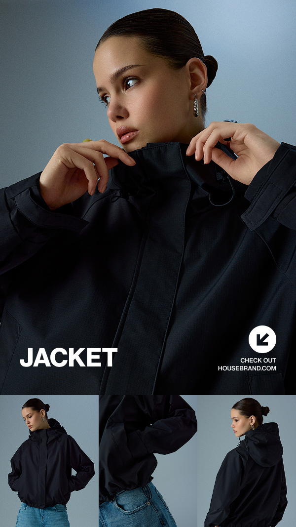JACKET. Donna con una giacca nera.