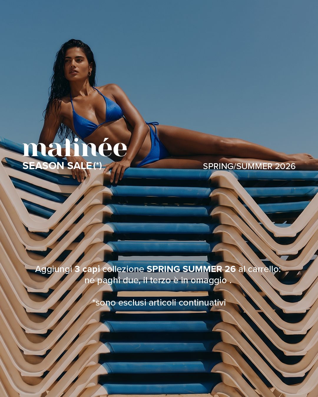 Person in a blue bikini reclining on stacked sunloungers under a clear sky with Spring/Summer 2026 season sale overlay