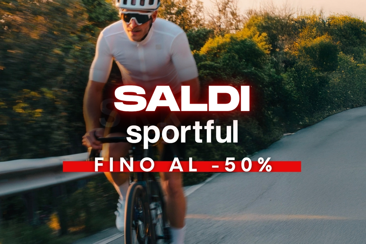 Road cyclist riding on a country road at sunset with overlay advertising Sportful sale — up to 50% off