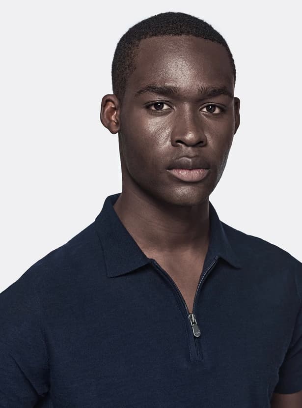 Polo in cotone e lino con zip