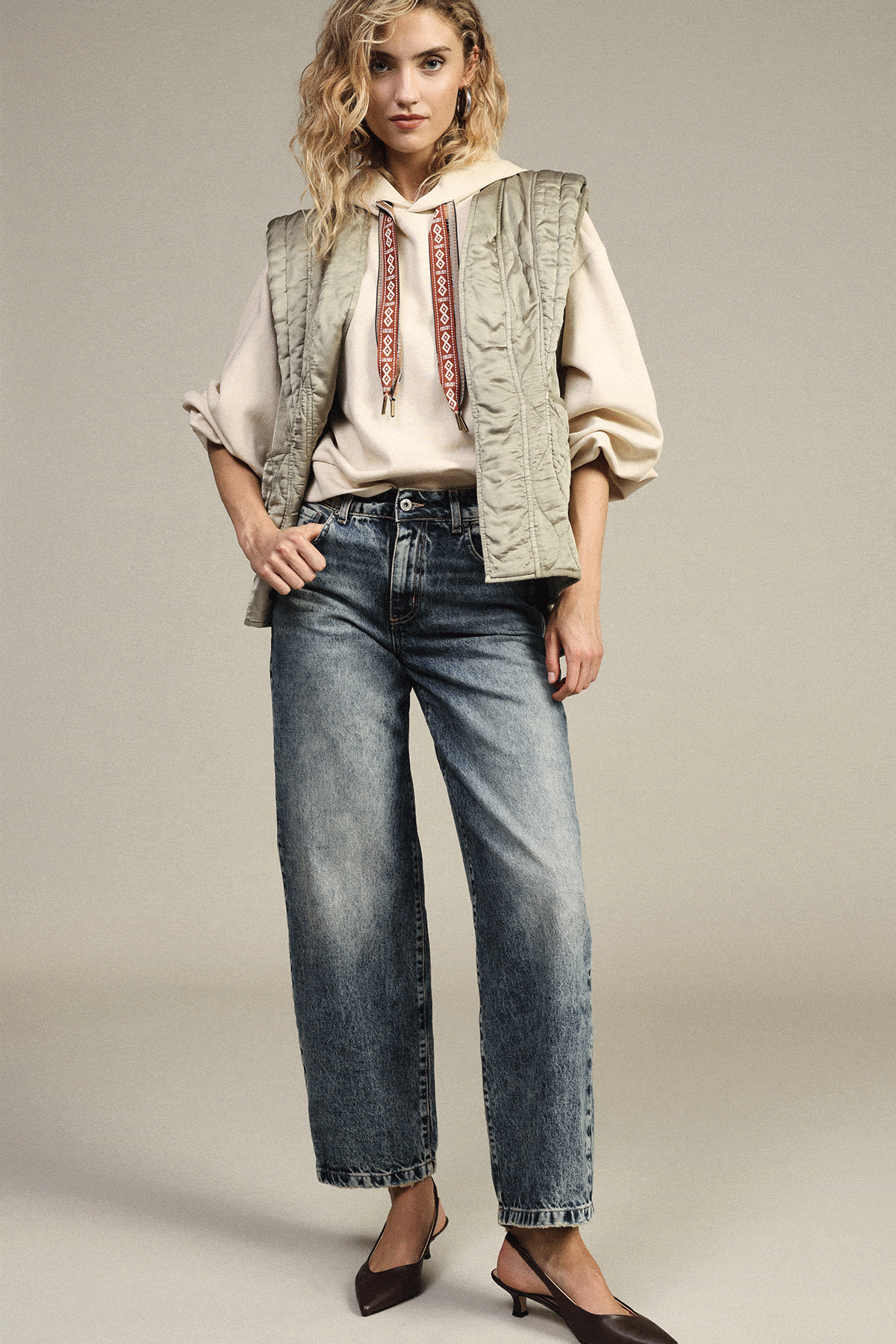 Three-panel model in denim: cropped straight jeans & vest; patchwork cargo jeans & oversized shirt; wide-leg jeans & patterned vest