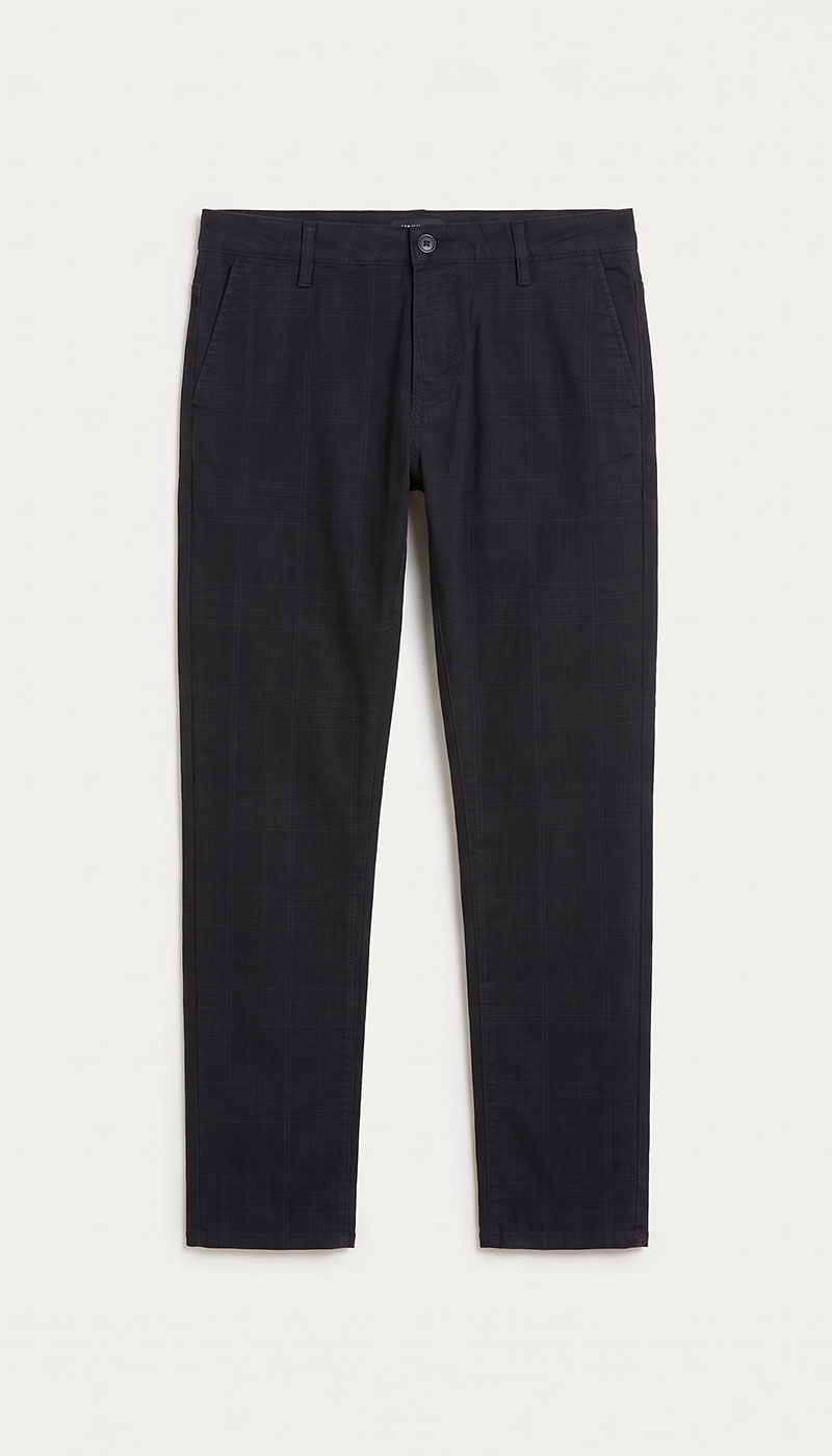 Black slim-fit men's trousers with subtle check pattern, button-and-zip fastening and side pockets, laid flat