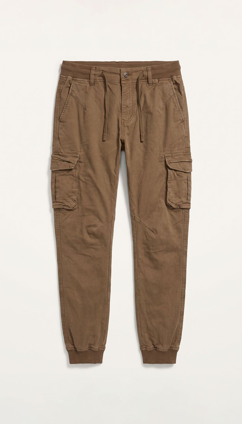 Brown cargo jogger trousers with drawstring waist, multiple patch pockets and elasticated cuffs, flat-lay on white background
