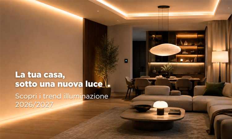 Modern open-plan living and dining room with warm recessed and pendant lighting, neutral furnishings and cosy ambient glow