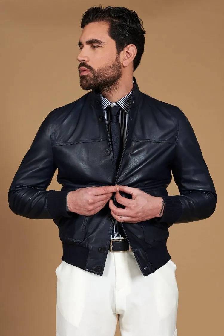 Image of Giubbotto Bomber in pelle blu con bottoni effetto liscio