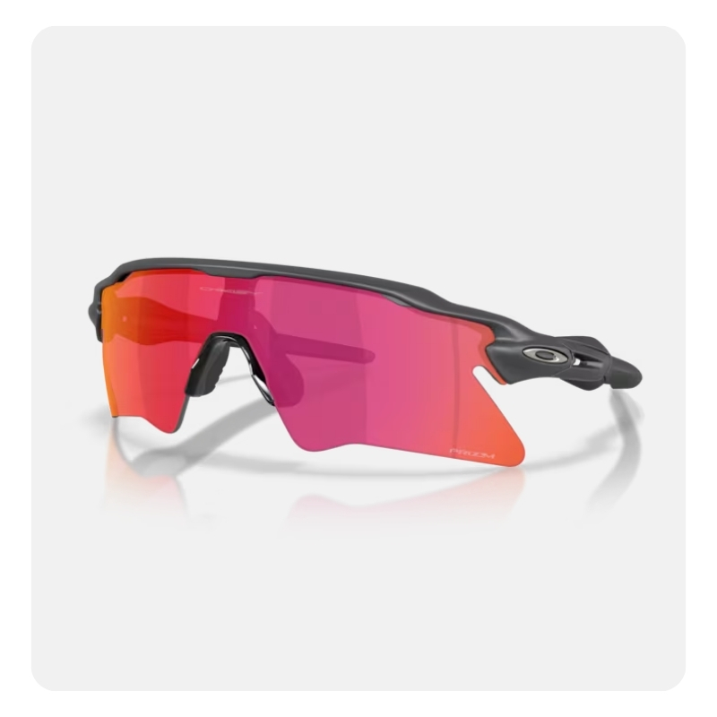 Oakley sports sunglasses with black frame and single pink‑red PRIZM shield lens on white background