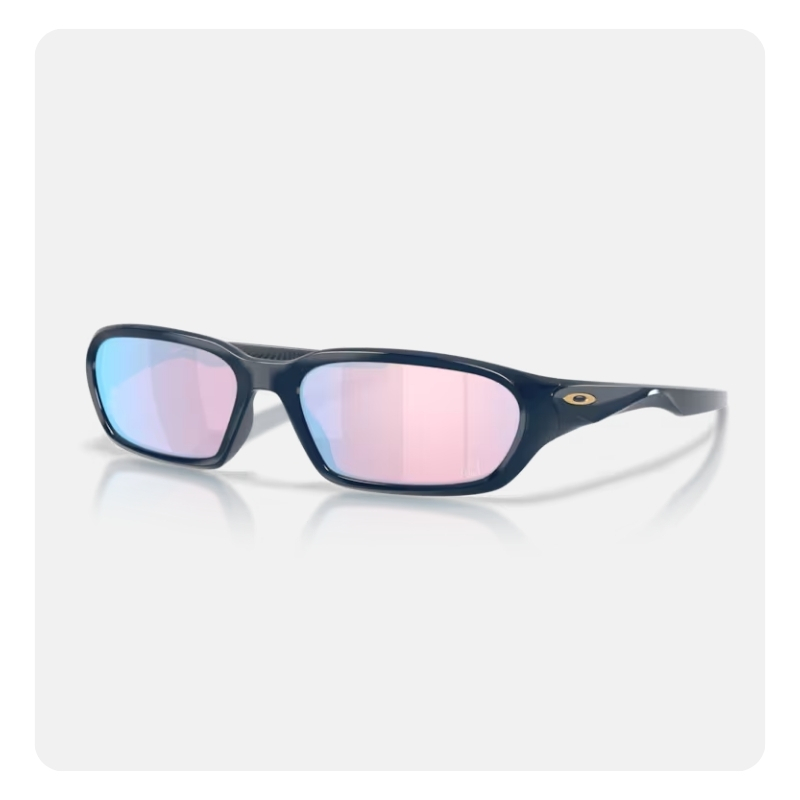 Dark navy Oakley sports sunglasses with narrow rectangular pink mirrored lenses and gold 'O' logo on the temple on white background