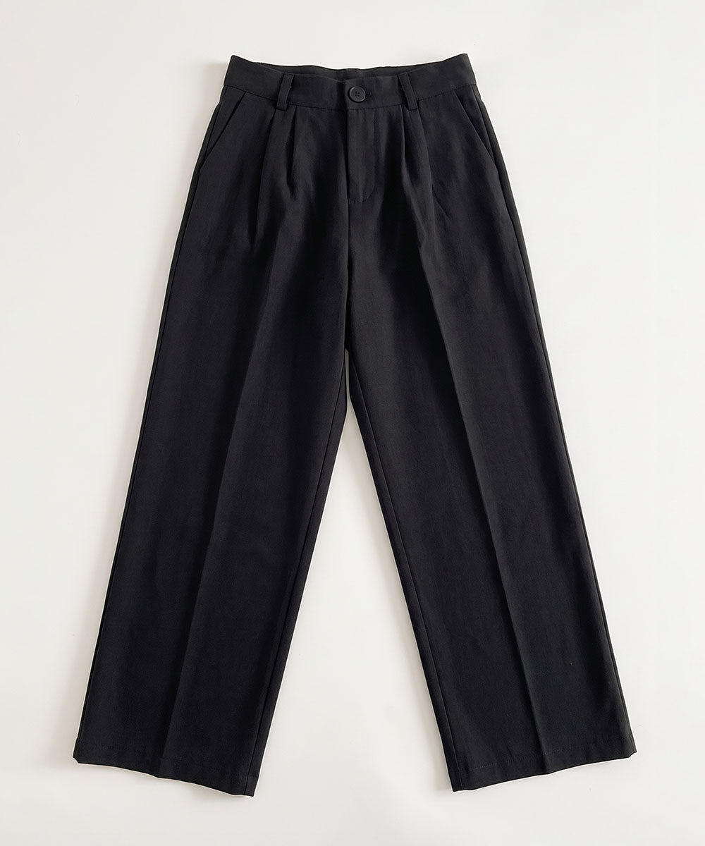 Black wide-leg pleated trousers with high waist and button fastening, flat-lay on white background for women's smart-casual wear
