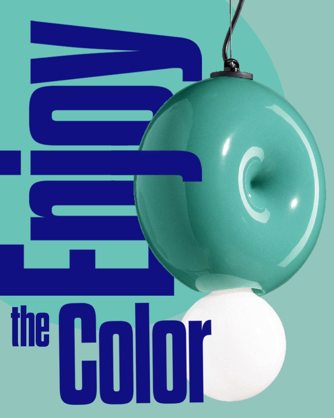 Glossy teal donut-shaped pendant lamp over a white globe bulb on teal background with bold blue vertical 'the Color' text