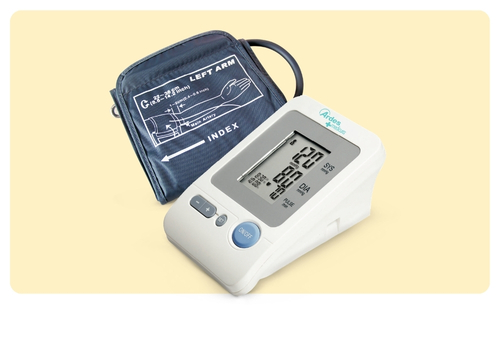 Digital upper-arm blood pressure monitor with cuff and large LCD showing systolic, diastolic and pulse readings