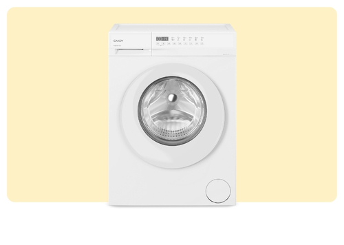 Front-loading white washing machine with clear glass door on a pale yellow background, modern household appliance