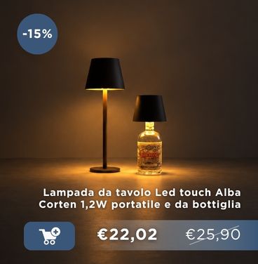 Two LED touch table lamps on a dark surface — tall Corten-style lamp and bottle-shaped portable lamp lit warmly with price tag visible