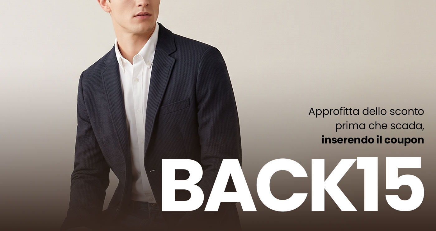 Cropped image of a male model in a navy blazer and white shirt beside large promotional text "BACK15" indicating a discount coupon