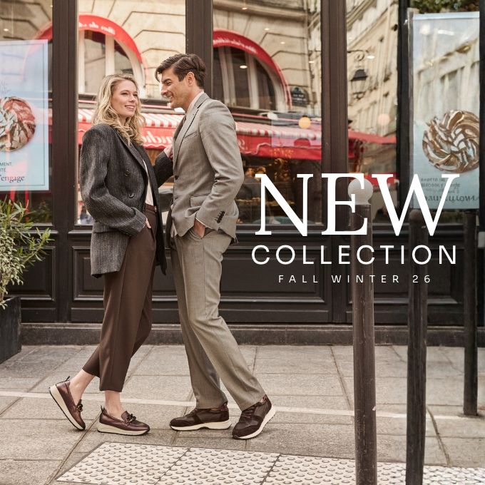 Stylish man and woman in fall-winter tailored outfits and loafers standing outside a Parisian café storefront, 'New Collection' text overlay