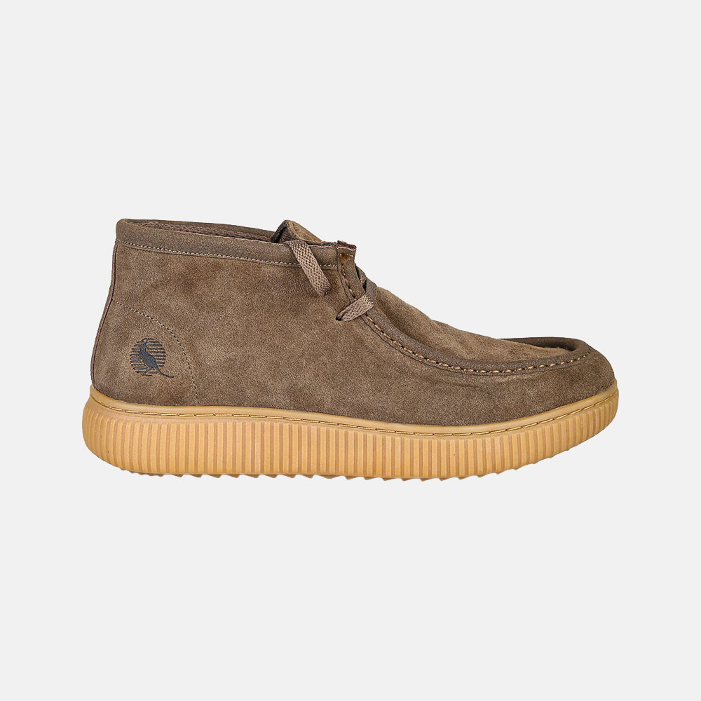 Brown suede chukka boot with gum rubber sole, lace-up ankle design, side profile on white background