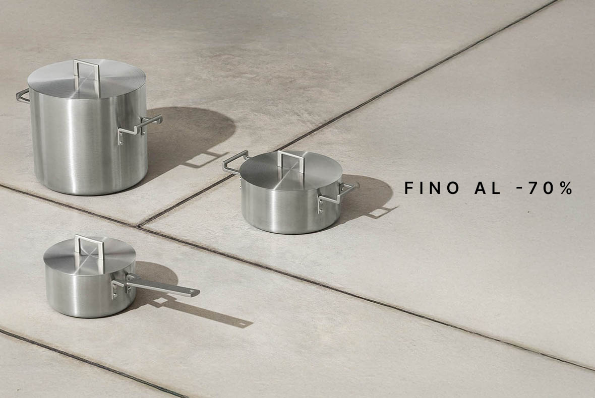 Three stainless steel saucepans with lids on a tiled surface, promotional text reading "FINO AL -70%"
