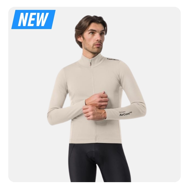 Light beige long-sleeve men’s cycling jersey with full zip and AirCore logo, model wearing black bib shorts
