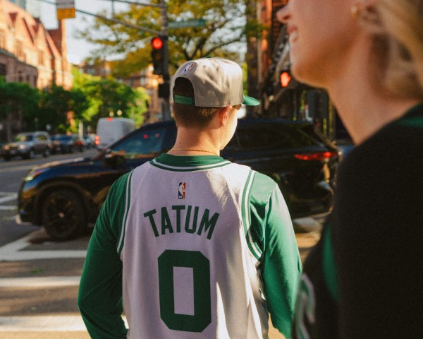 Model wears Tatum white Boston Celtics jersey