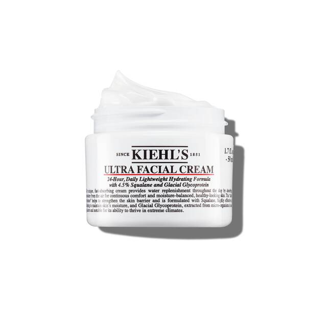 Vasetto aperto di Kiehl's Ultra Facial Cream con texture bianca visibile su sfondo bianco