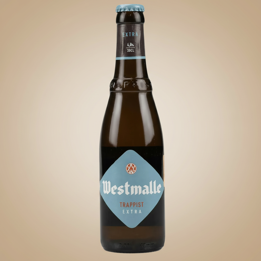A bottle of Westmalle Trappist Extra beer with a light blue label.