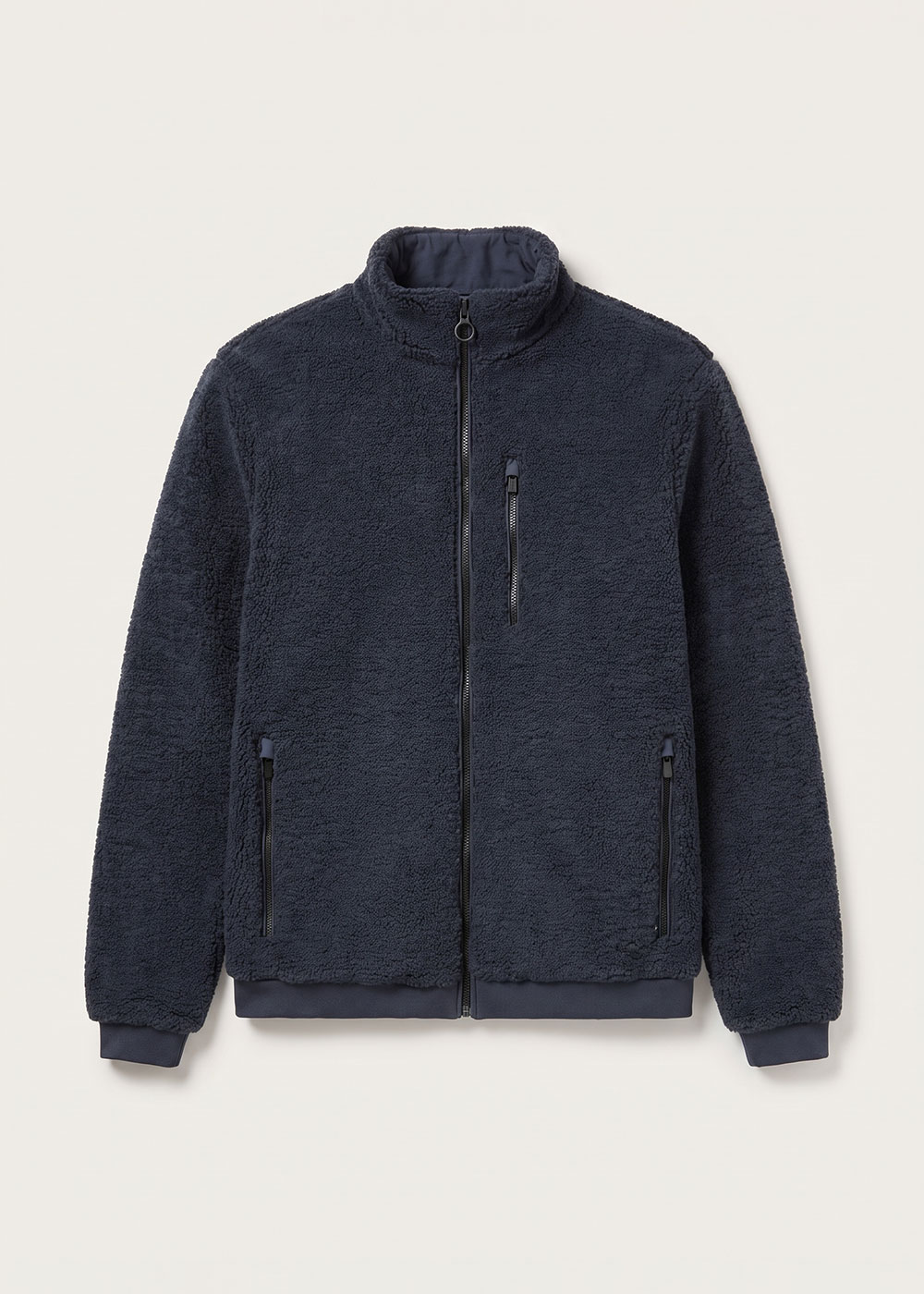 Men's navy sherpa fleece jacket, front view with full zip, high collar and three zip pockets on plain background