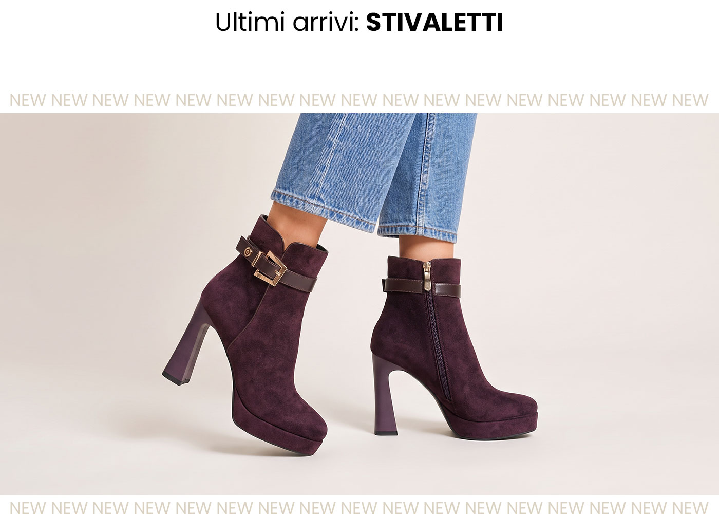 Plum suede ankle boots with high block heels and platform, decorative buckle and side zip, model wearing cropped blue jeans on neutral background