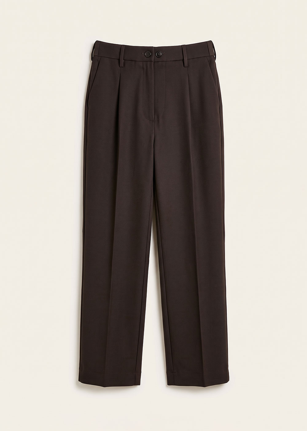 Dark brown pleated tailored trousers with button waist and belt loops, straight-leg, laid flat on a cream background