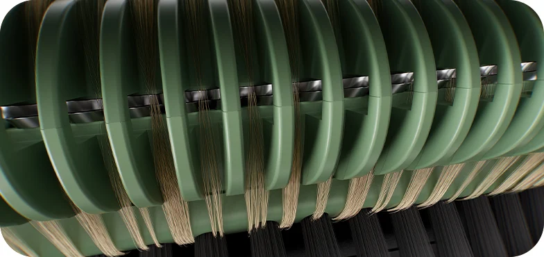 Close-up of green curved forms over woven beige and black strands Close-up of green curved forms over woven beige and black strands