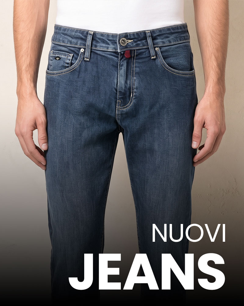 Front view of men's dark blue straight-fit jeans on model waist down, white 'NUOVI JEANS' logo overlay
