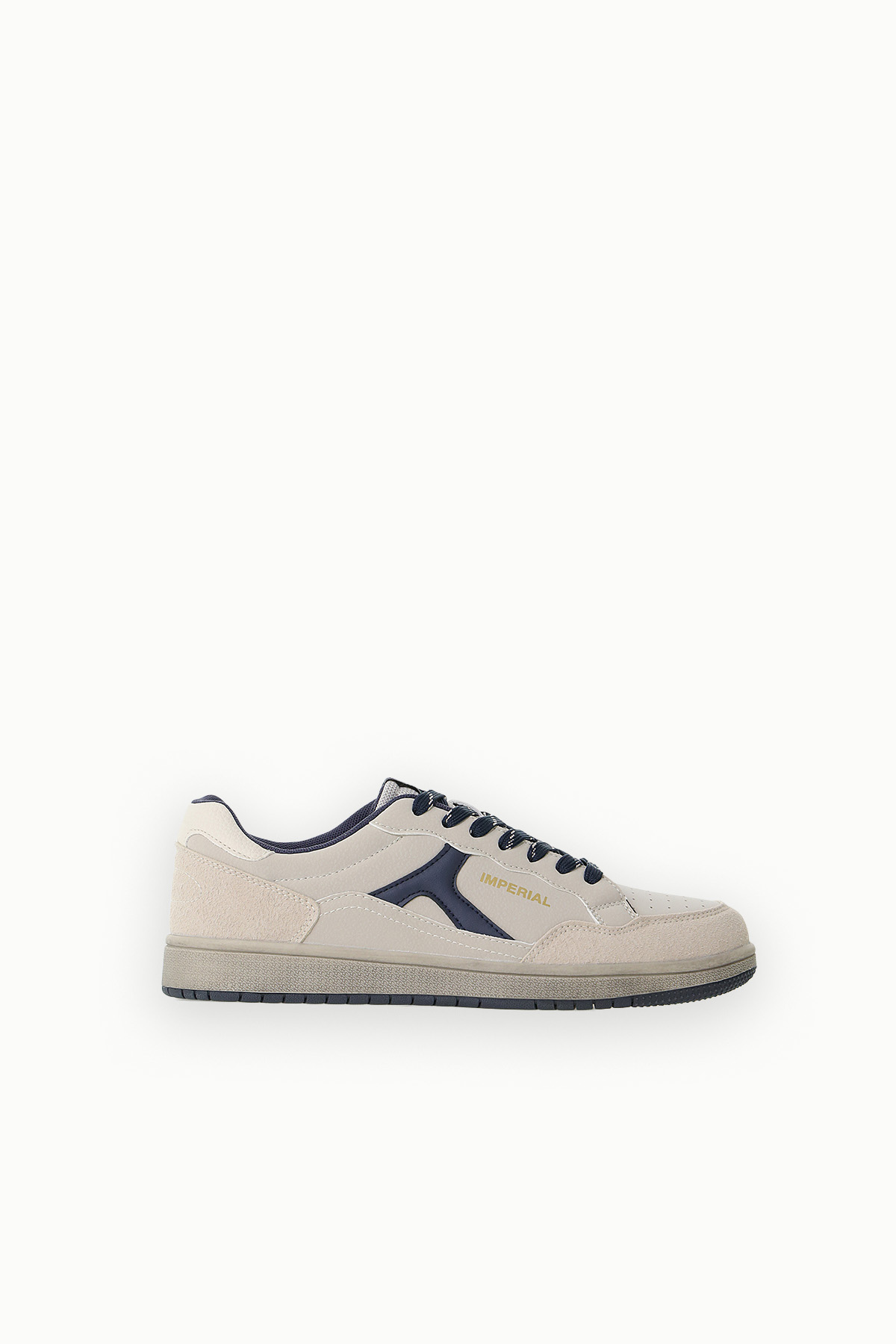 Cream and navy low‑top sneaker with lace‑up front, suede and leather panels, 'IMPERIAL' logo on side and flat rubber sole