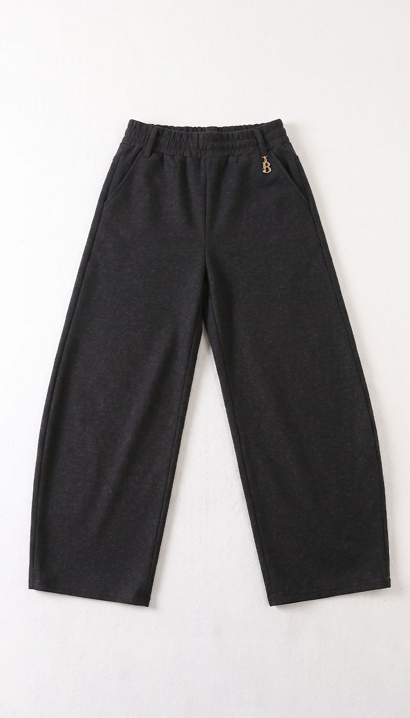 Black wide-leg casual trousers with elasticated waistband, side pockets and small gold logo charm — relaxed-fit women's bottoms