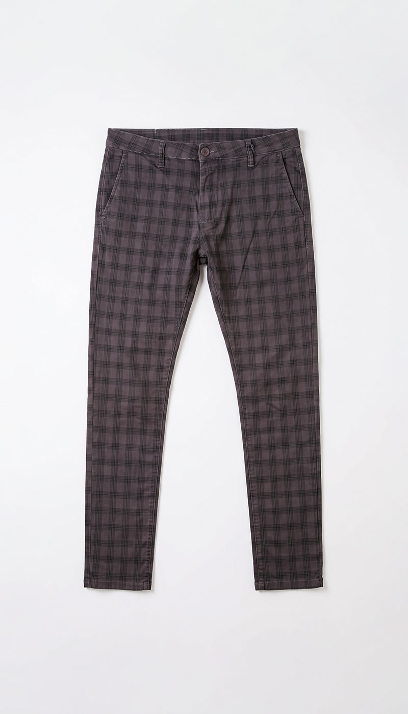 Slim-fit men's grey check trousers laid flat on white background, front pockets and buttoned waistband
