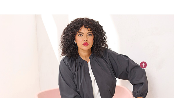 Elegante blouson con scollo rotondo e maniche lunghe
