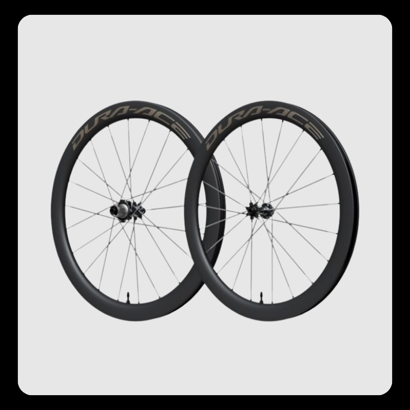 Pair of Shimano Dura-Ace carbon deep-section road bike wheels with black aerodynamic rims, silver logos and spokes