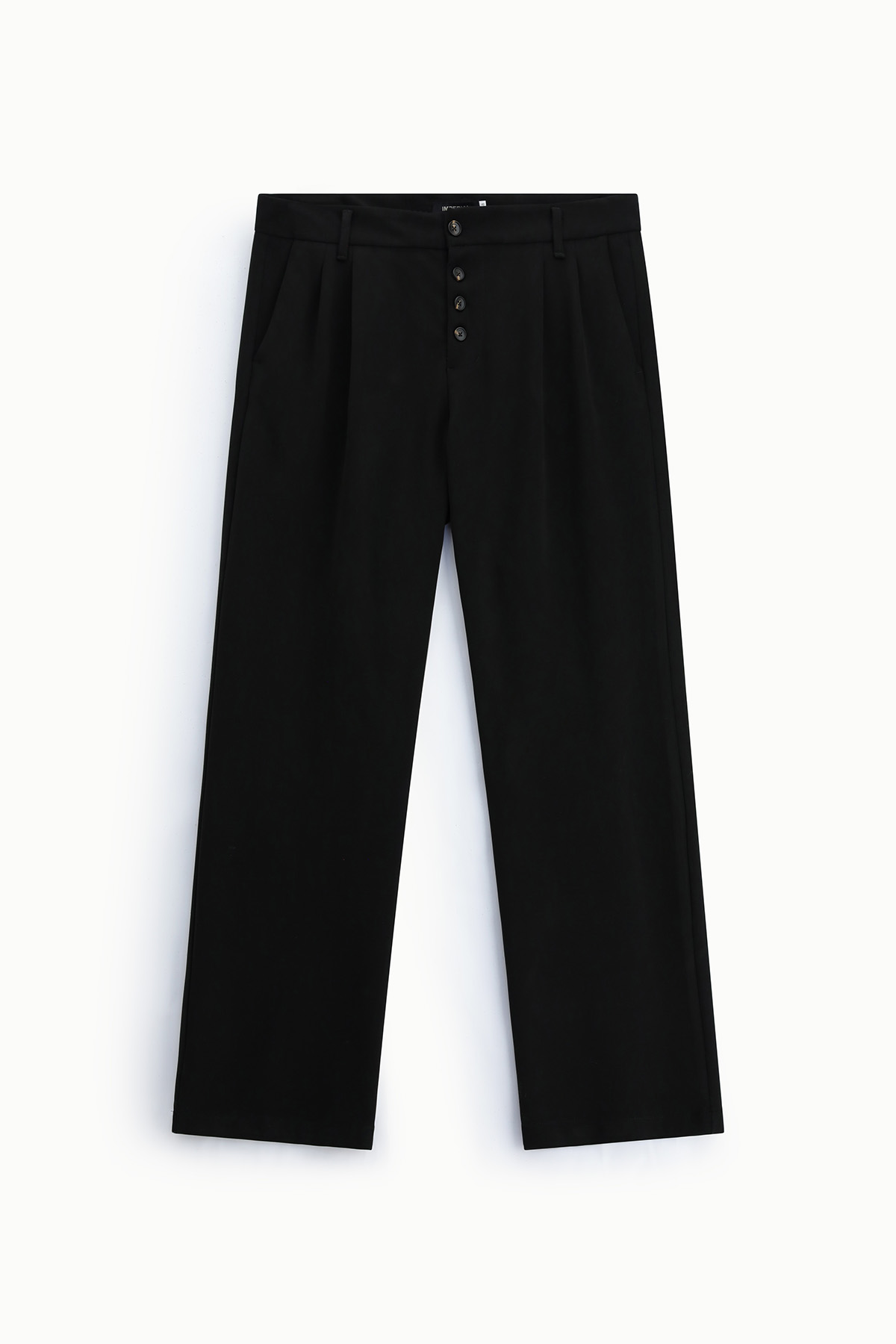 Black wide-leg trousers with button-fly, front pleats and belt loops, flat-lay on white background