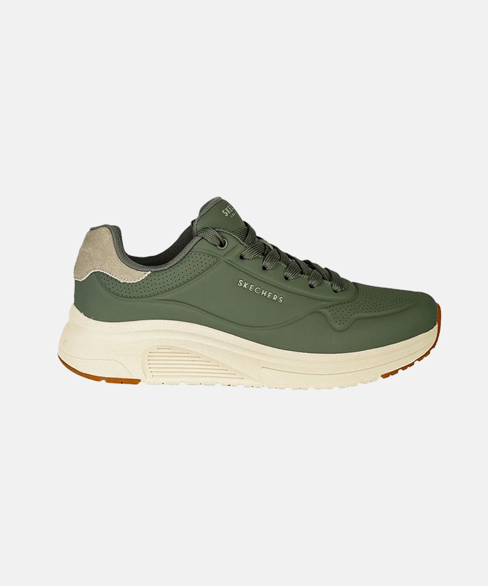 Green Skechers lace-up trainer with cream chunky sole, suede heel detail and side logo — casual everyday sneaker