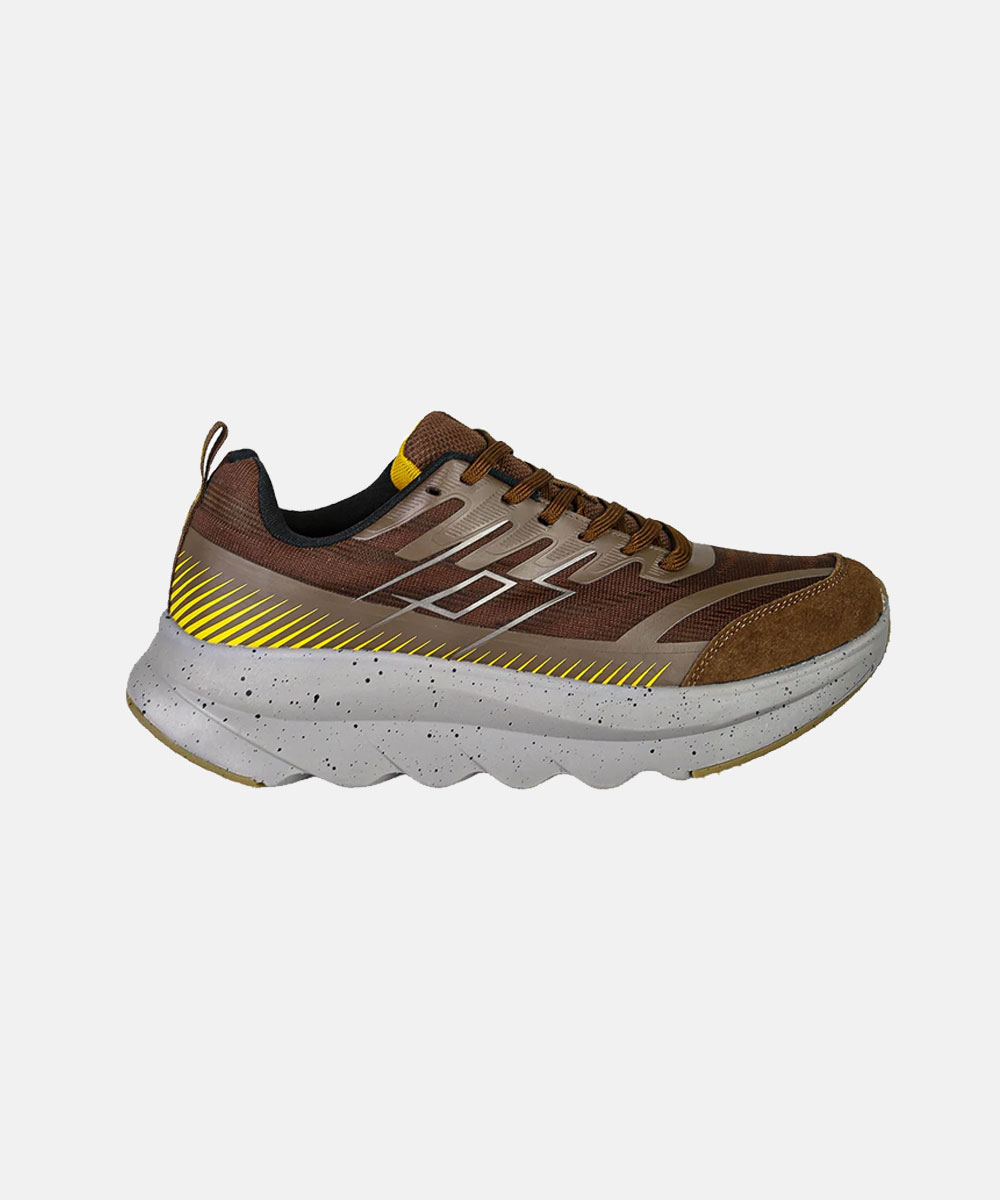 Brown men's athletic sneaker with suede toe, yellow accents and speckled white chunky sole, side view on white background