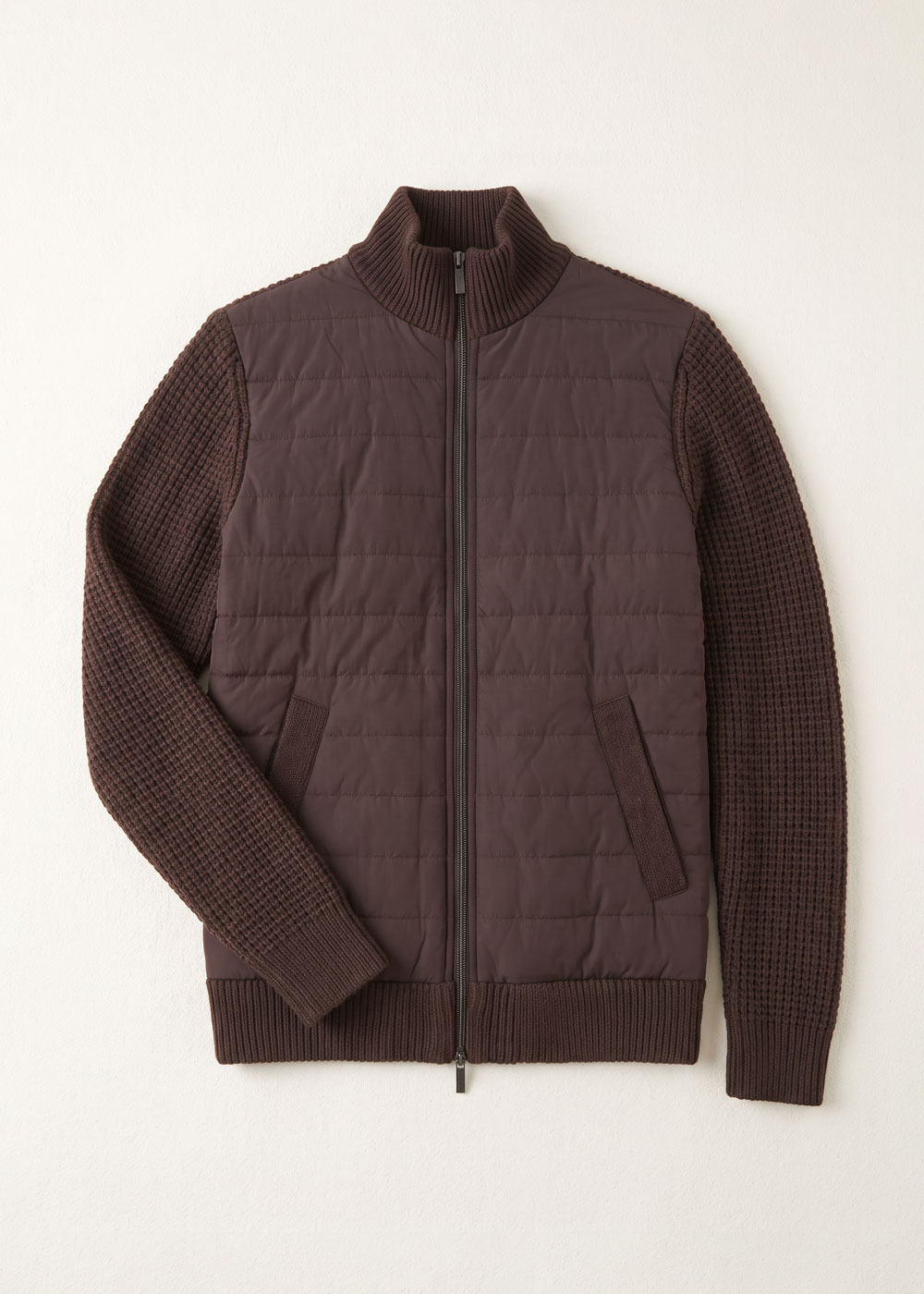 Men's brown quilted zip cardigan with knitted sleeves, stand collar, ribbed cuffs and welt pockets