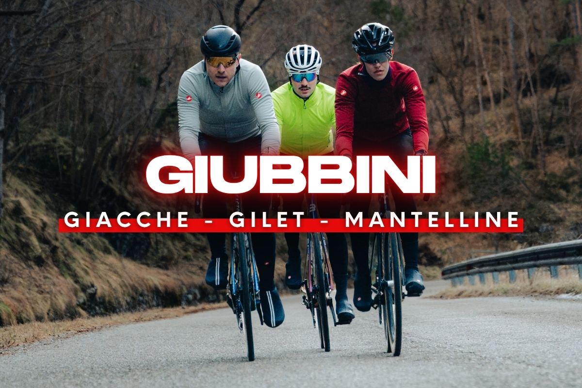 Three cyclists riding on a rural road wearing winter cycling jackets and gilets, bold 'GIUBBINI' logo and Italian product text overlay