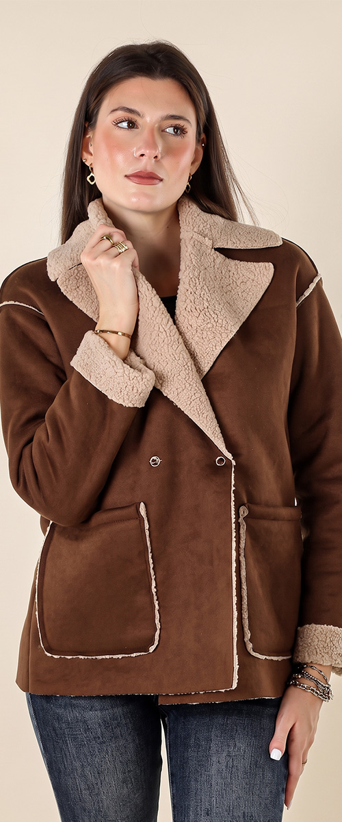 Woman modelling brown suede-look shearling-lined jacket with large collar, patch pockets and rolled cuffs